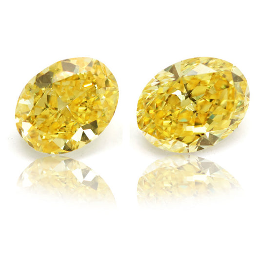 2.02ct Oval, Fancy Vivid Yellow Diamond (Pair), VS1/VS2 - GIA
