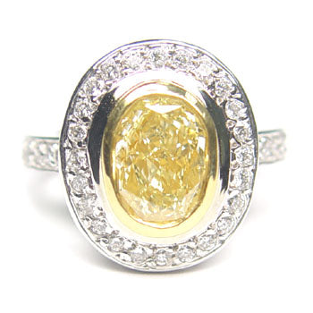 1.83ct Oval, Fancy Light Yellow Diamond Ring - GIA